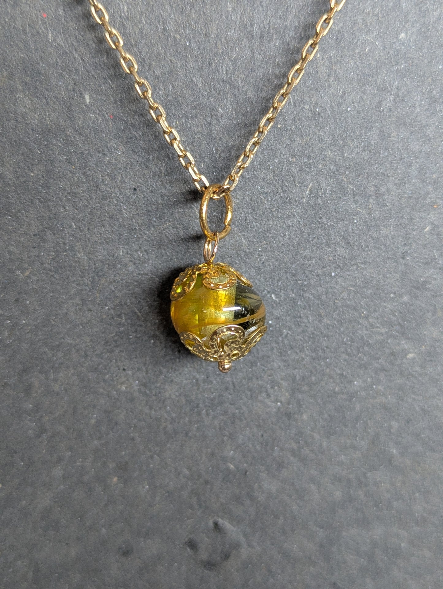 Soleil d'or · Pendentif