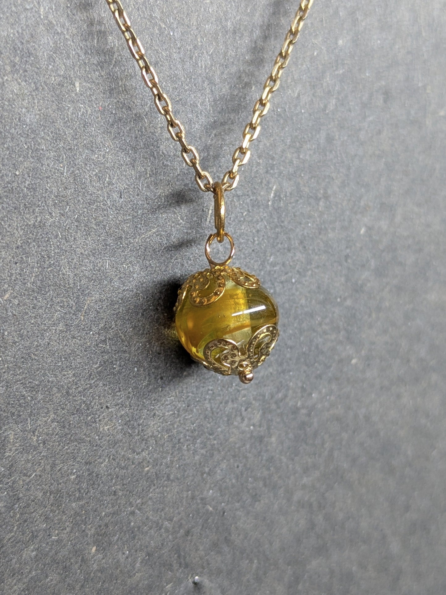Soleil d'or · Pendentif
