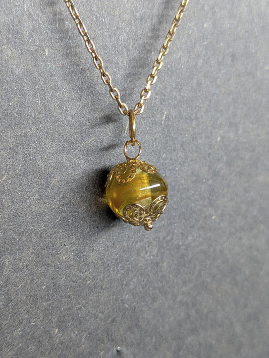 Soleil d'or · Pendentif