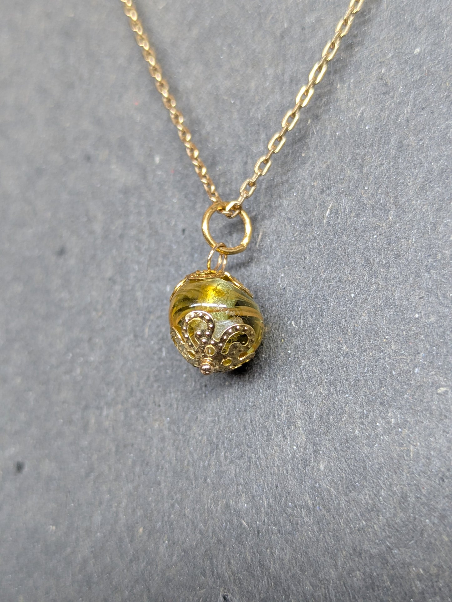 Soleil d'or · Pendentif