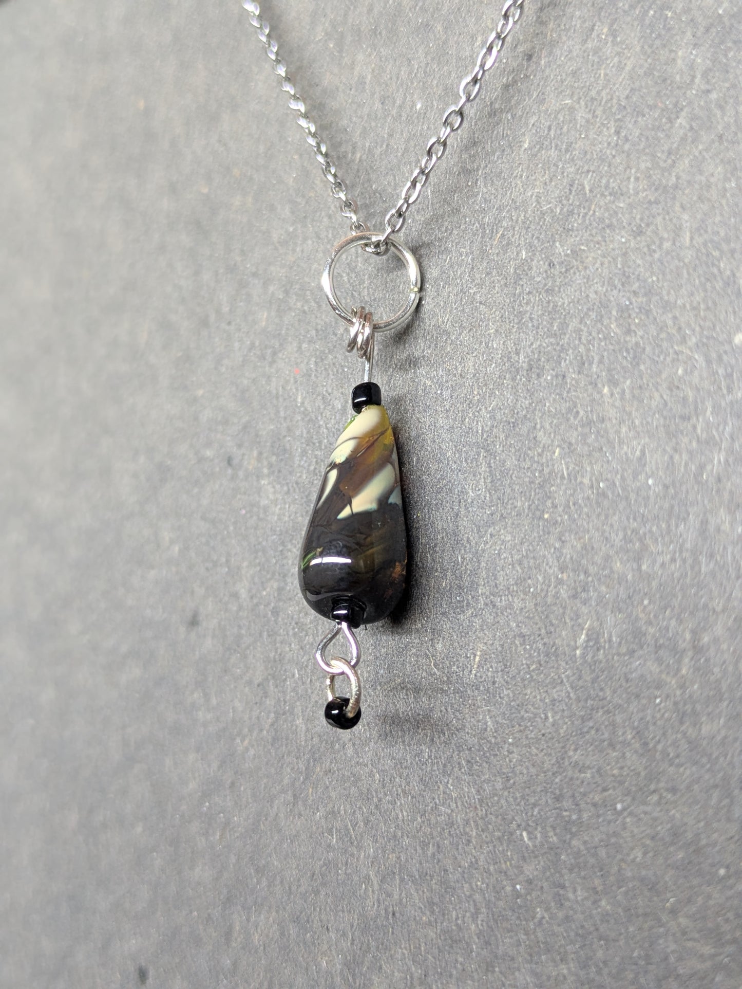 Raven · Pendentif
